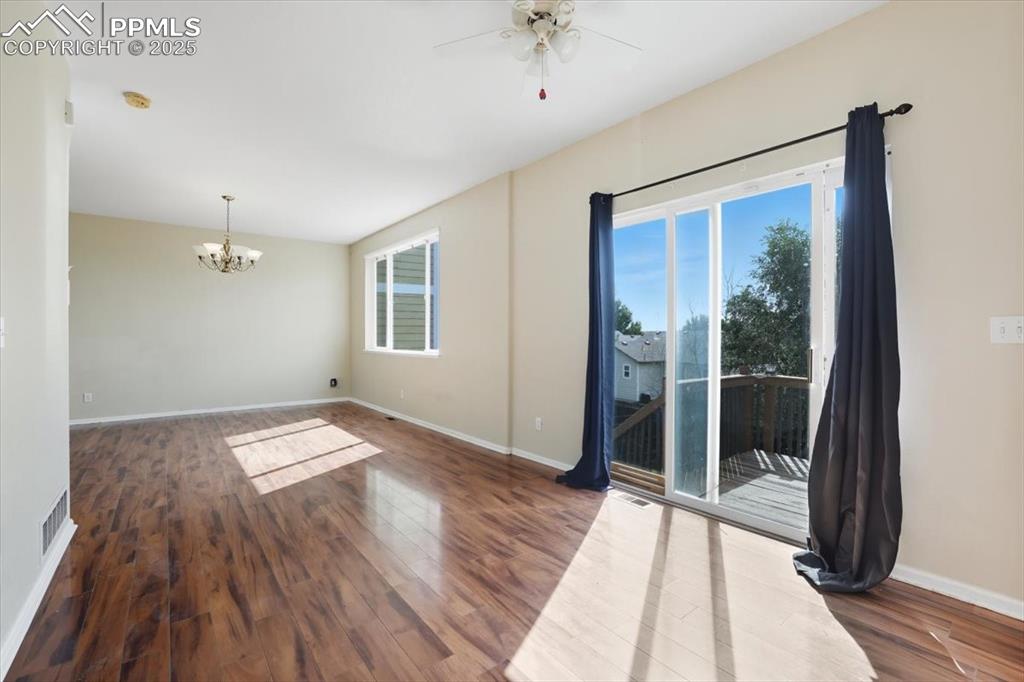 Image 7 of 44: Sliding door to raised deck.