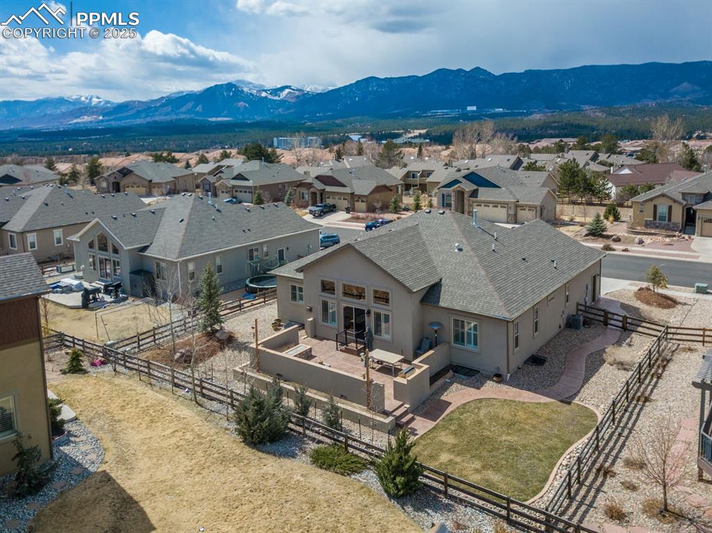 Image 47 of 47: Birds eye view of property with a mountain view and a residential view
