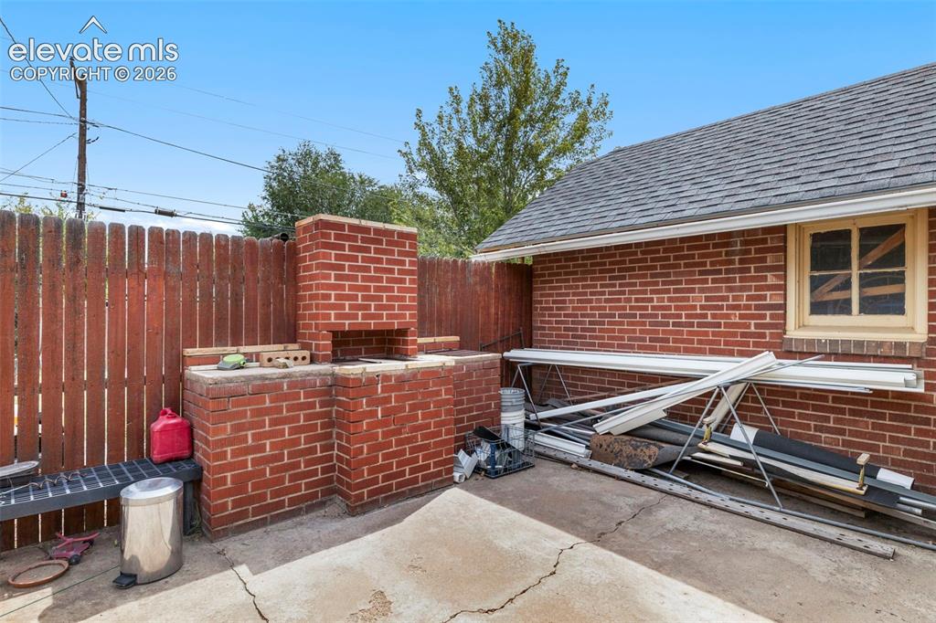 Image 24 of 29: Brick BBQ Pit