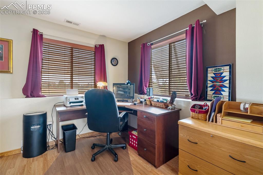 Image 24 of 38: Private office with great natural light