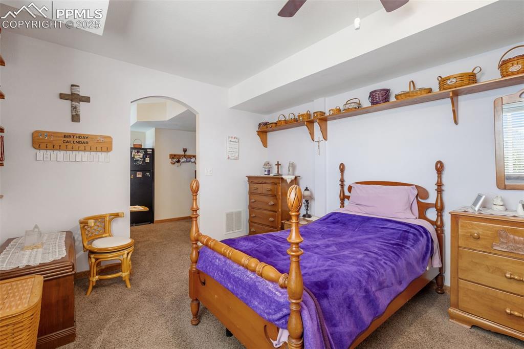 Image 27 of 38: Spacious lower-level master bedroom retreat