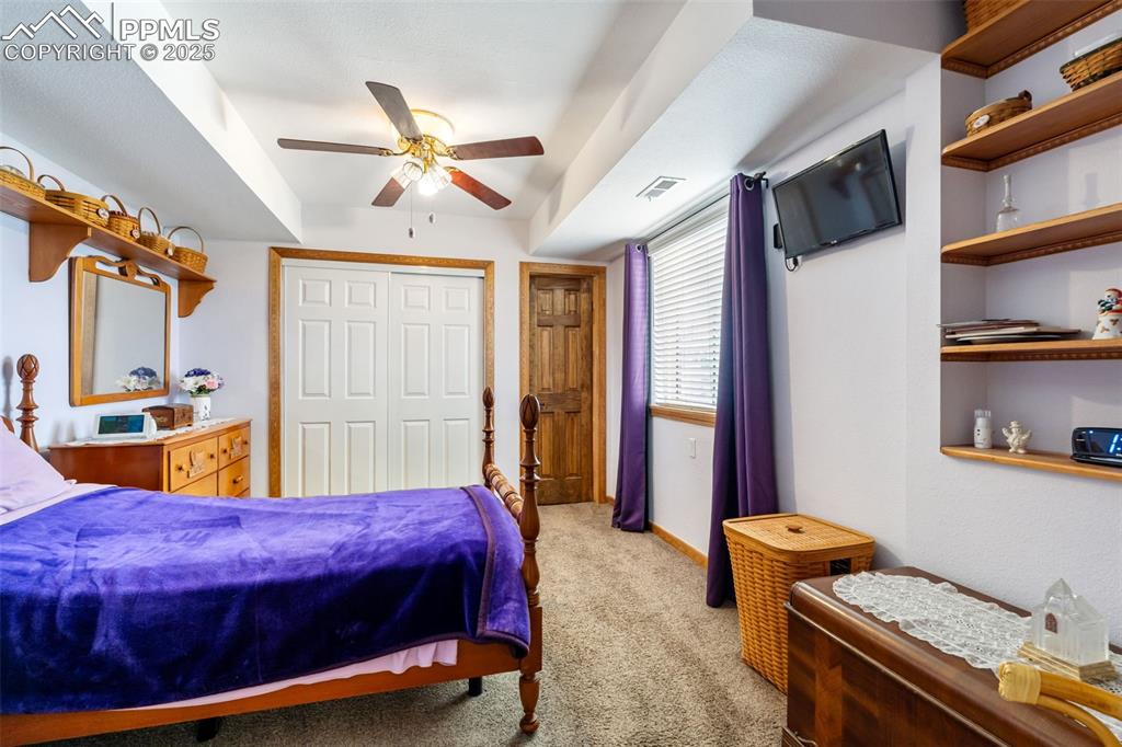 Image 29 of 38: Additional view of master suite with built-ins