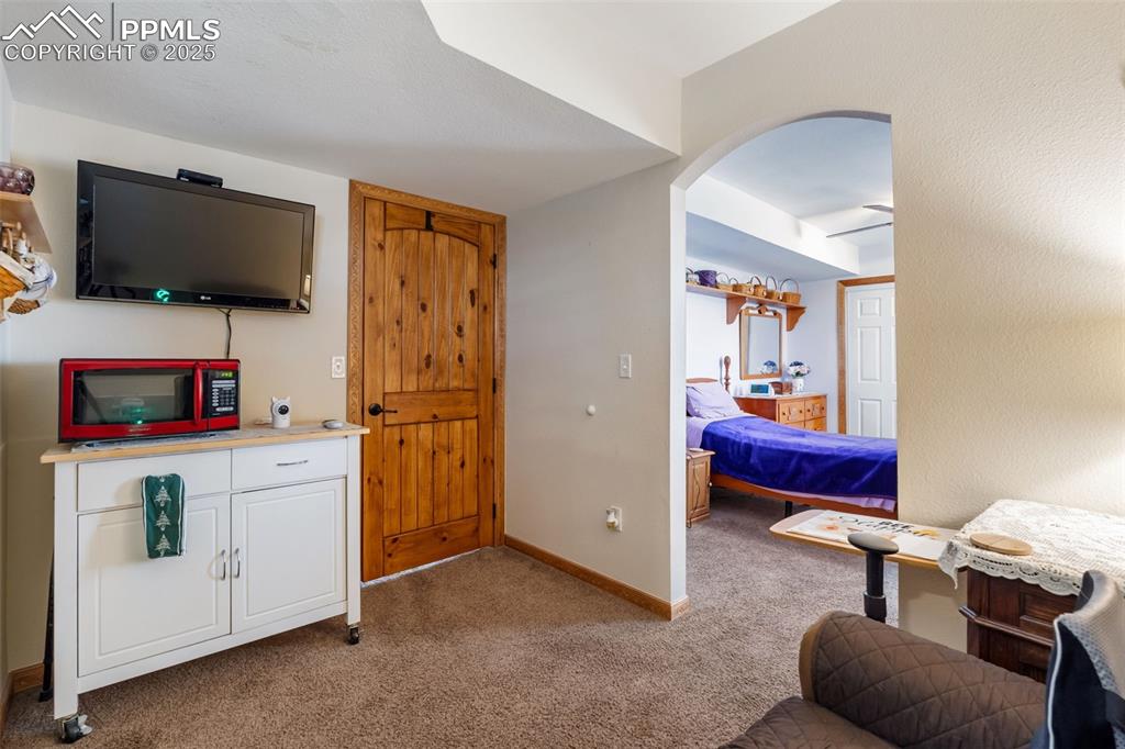 Image 31 of 38: Lower level master suite entry