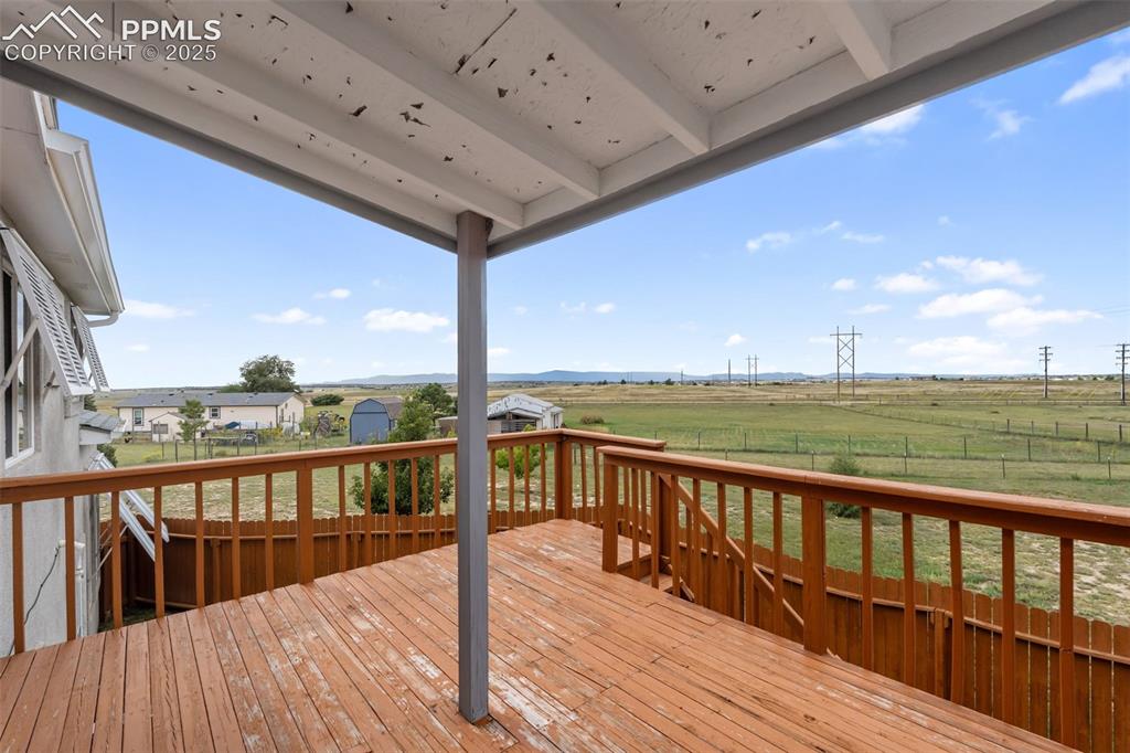 Image 33 of 38: Upper-level deck with expansive views
