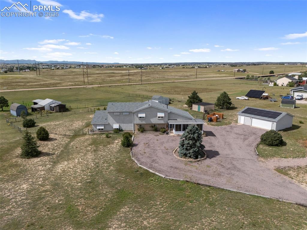 Image 38 of 38: Expansive 2.5-acre horse property with mountain views