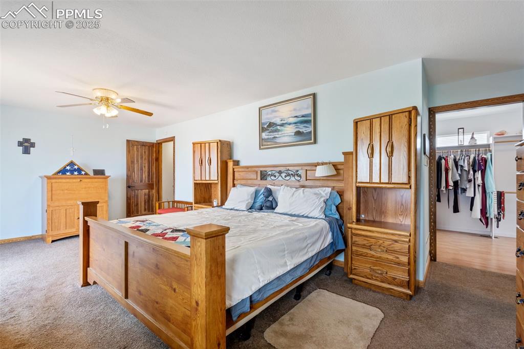 Image 9 of 38: Expansive master retreat with soaking tub and walk-in closet access