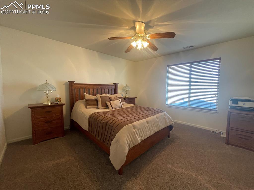 Image 11 of 19: Bedroom