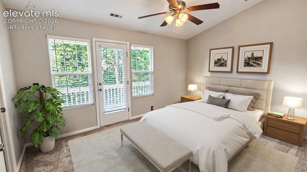 Image 15 of 27: Vaulted ceiling, ceiling fan with integrated lighting, wood-finish flooring