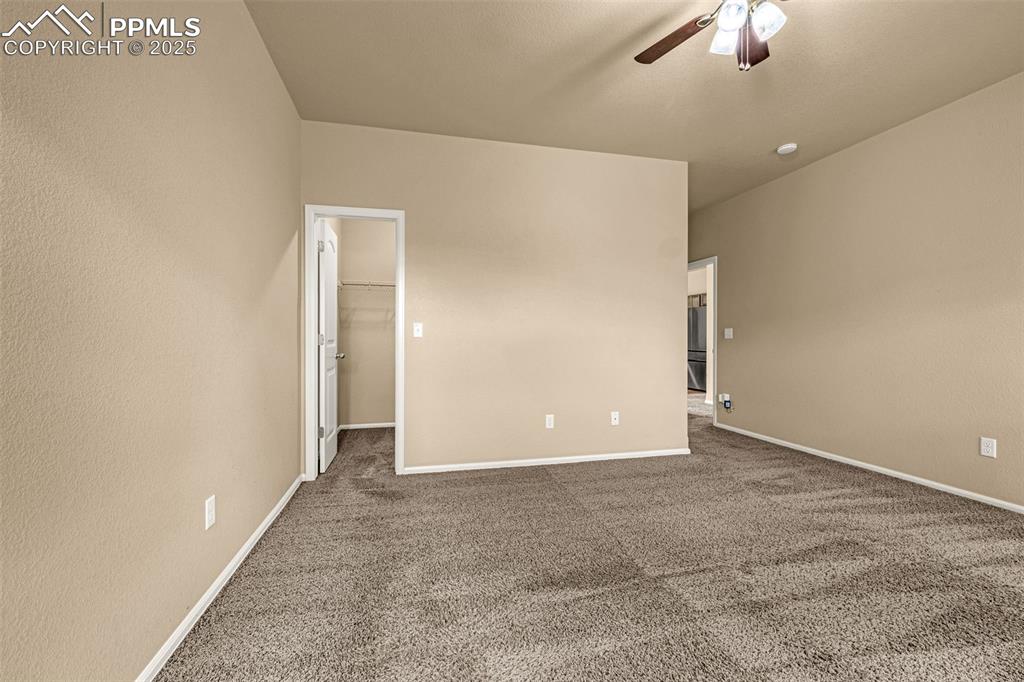 Image 15 of 28: Primary Bedroom with large walk-in closet and 5-piece bathroom.