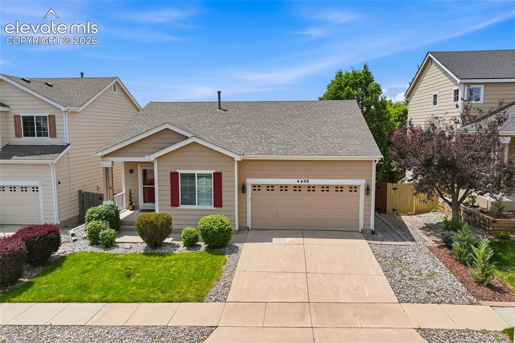 Image 1 of 45: Single-story residence featuring a two-car garage, concrete driveway, and a