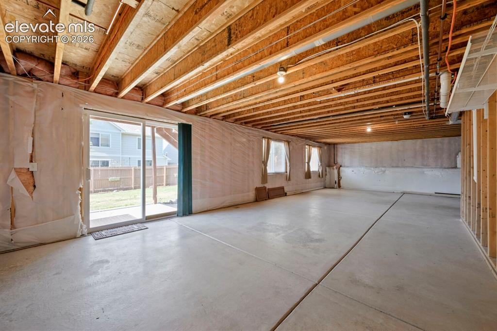 Image 12 of 45: light and bright large eat-in kitchen with plenty of cabinets and storage, 