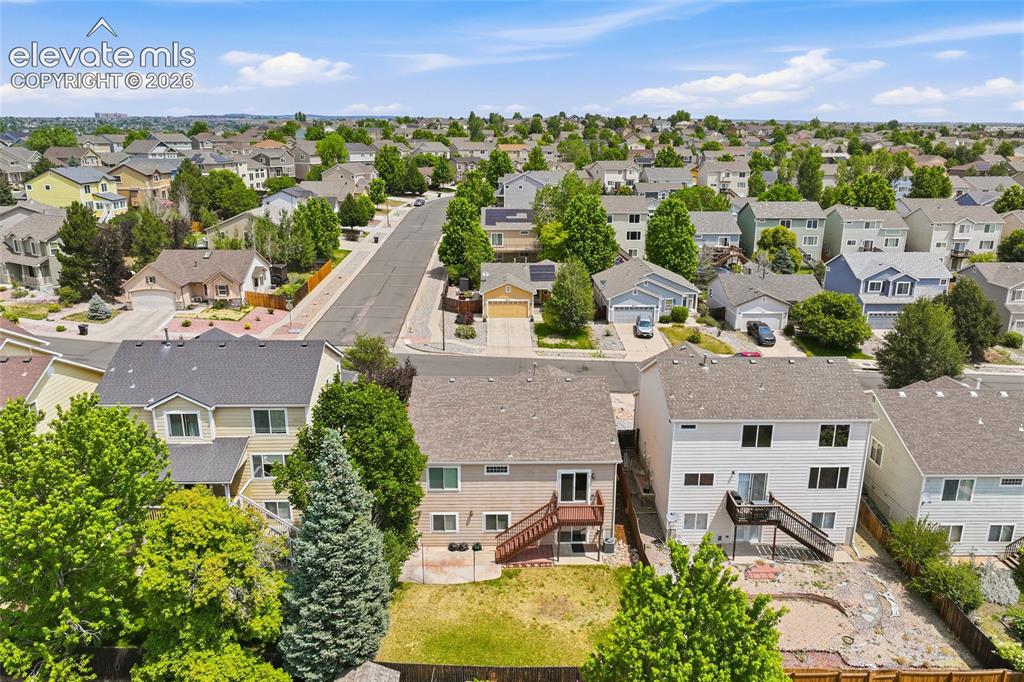 Image 33 of 45: Expansive neighborhood showcasing a variety of residential properties with 