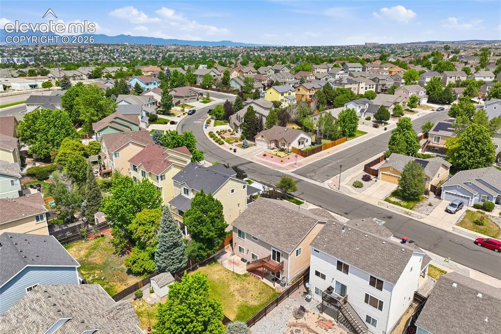 Image 34 of 45: Aerial perspective showcasing a residential neighborhood with varied archit