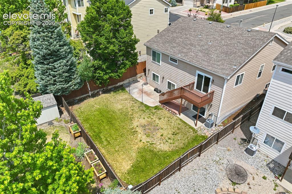 Image 37 of 45: Aerial perspective showcasing a residential neighborhood with varied archit