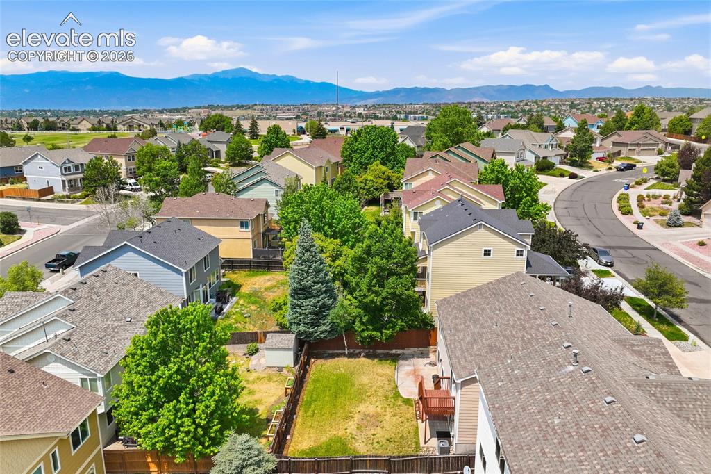 Image 38 of 45: Aerial perspective showcasing a residential neighborhood with numerous deta