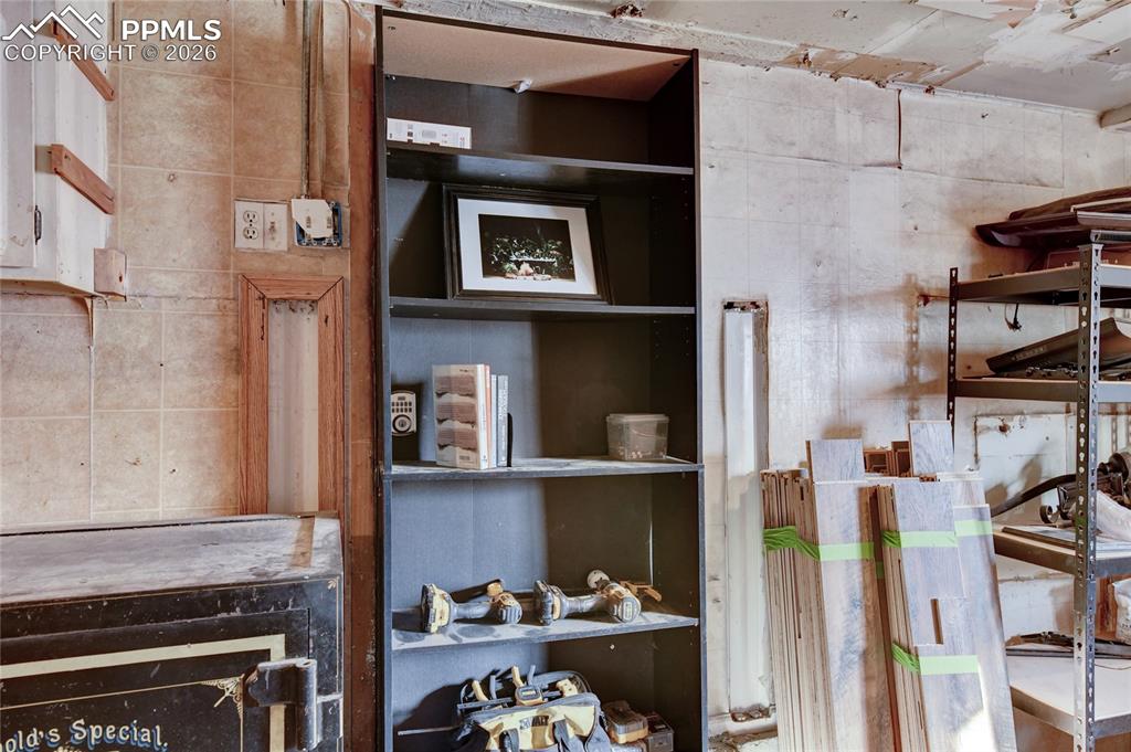 Image 27 of 29: Hidden door inside Garage