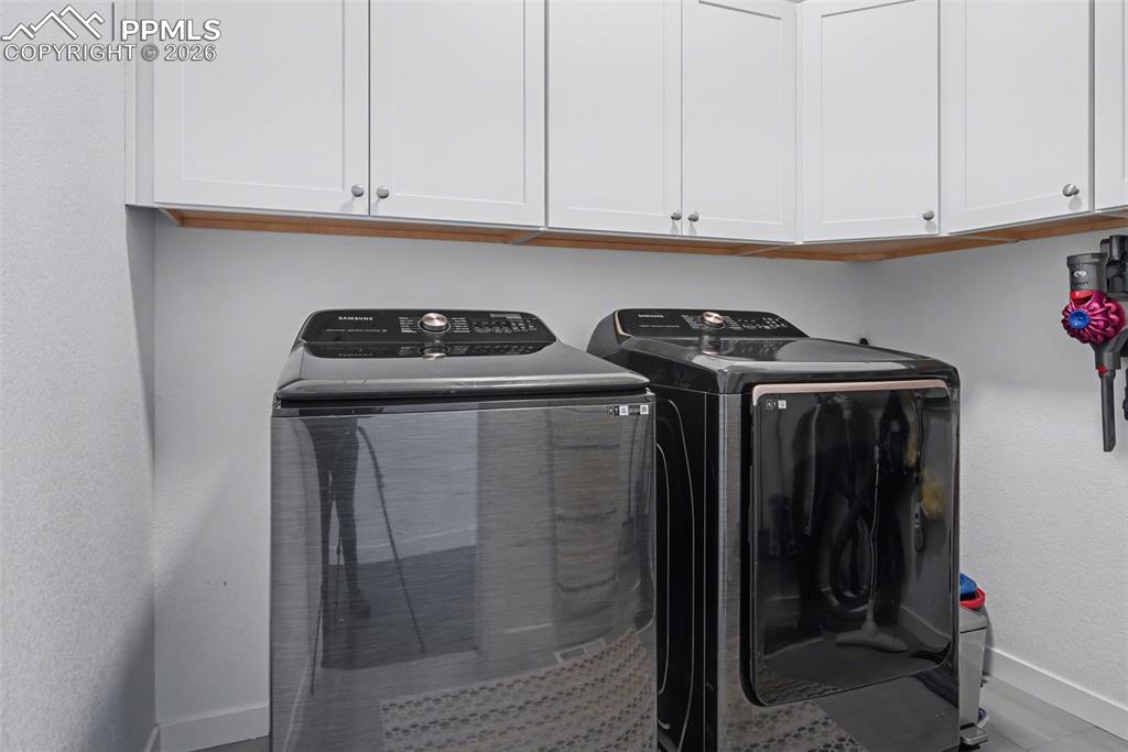 Image 18 of 37: Office featuring light colored carpet and baseboards