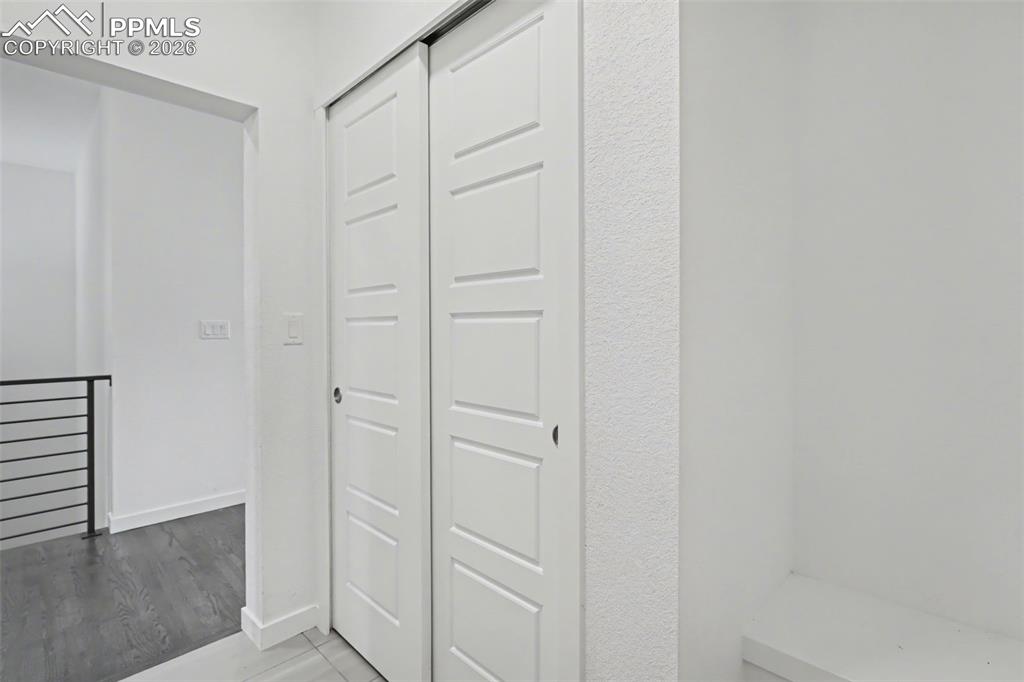 Image 19 of 37: Home office with carpet flooring and baseboards