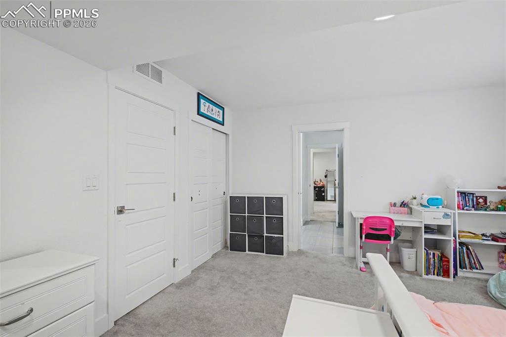 Image 25 of 37: Bathroom with toilet and a sink