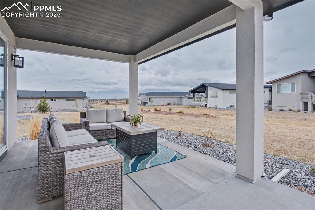 Image 35 of 37: Bathroom with baseboards and a textured wall