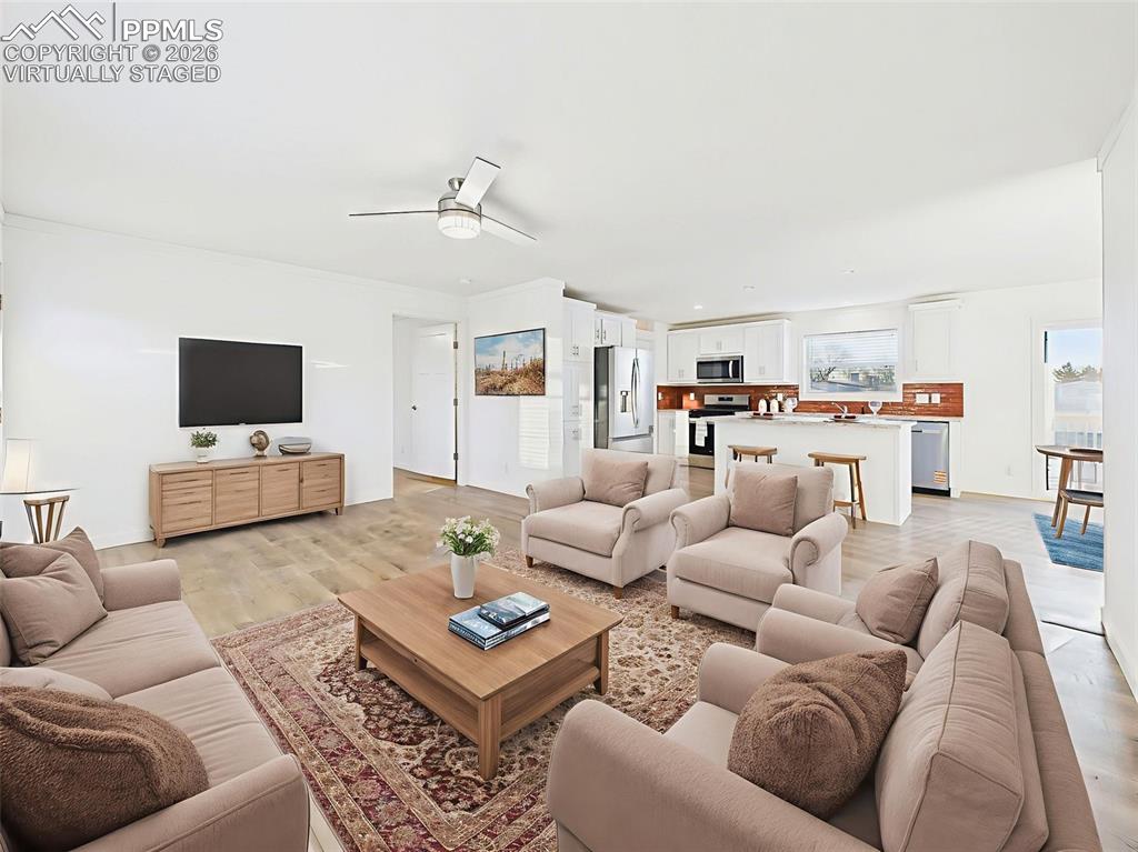 Image 22 of 50: Virtually Staged This flexible main room showcases potential for multiple s