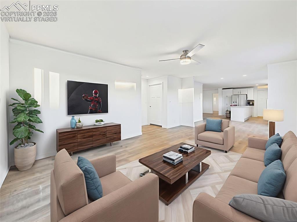 Image 4 of 50: Virtually Staged A second living space offers flexibility for a media room,