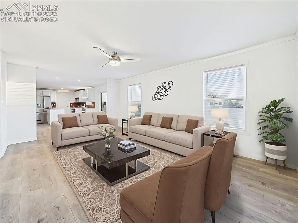 Image 6 of 50: Virtually Staged This inviting living space connects beautifully to the kit