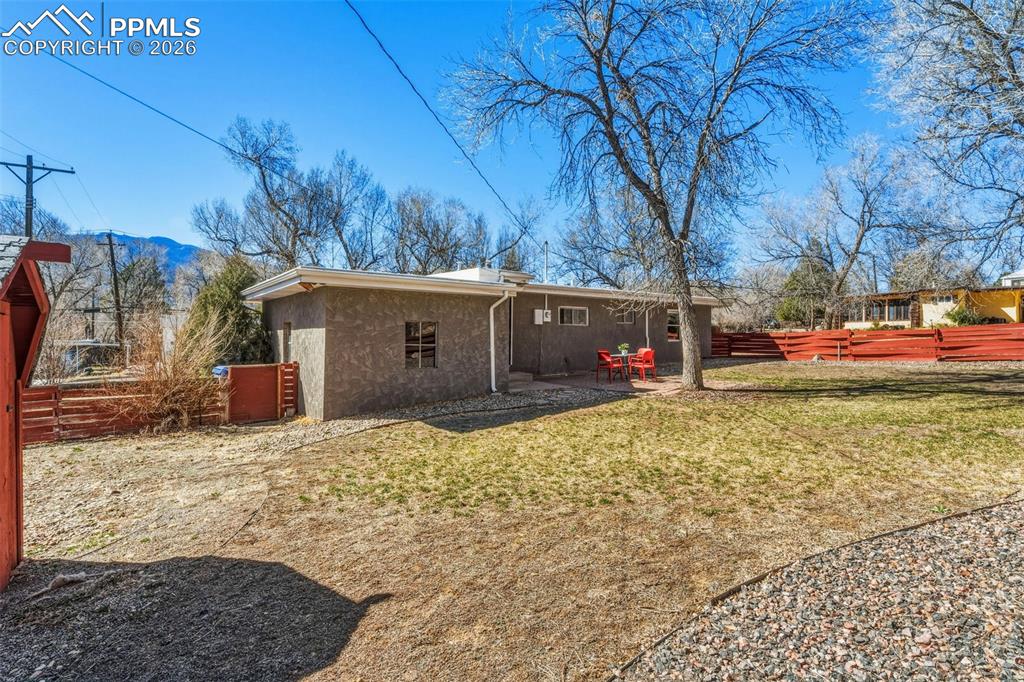 Image 16 of 49: Fully fenced backyard