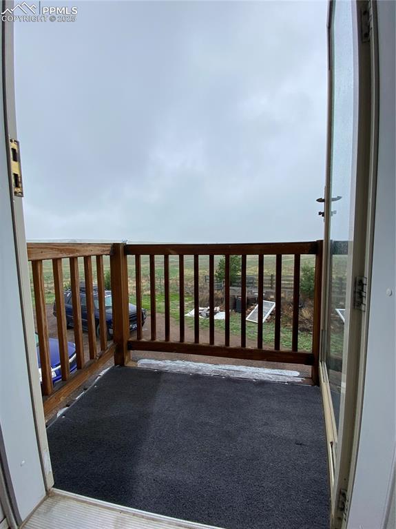 Image 19 of 48: Sunny south-facing princess deck directly off the laundry room, providing e