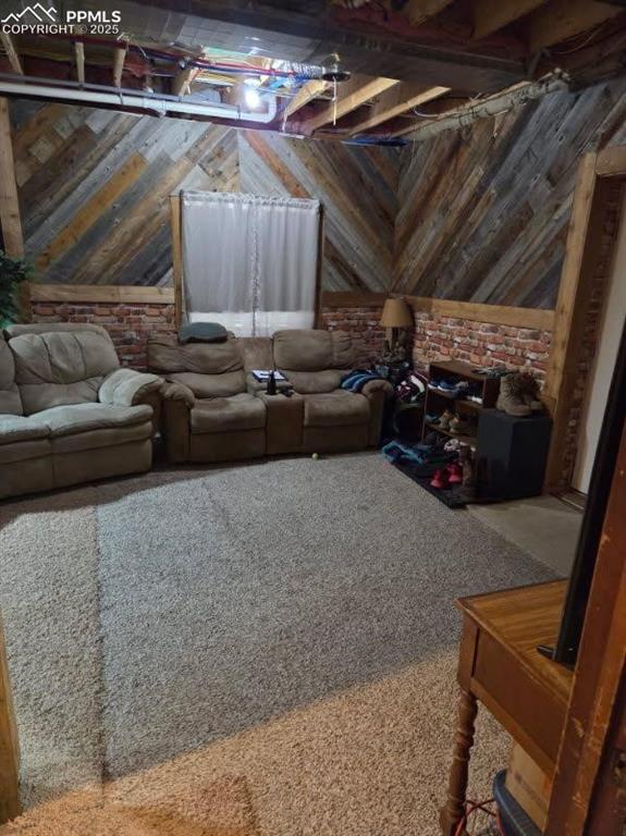 Image 20 of 48: Spacious walk-out basement family room with direct driveway access