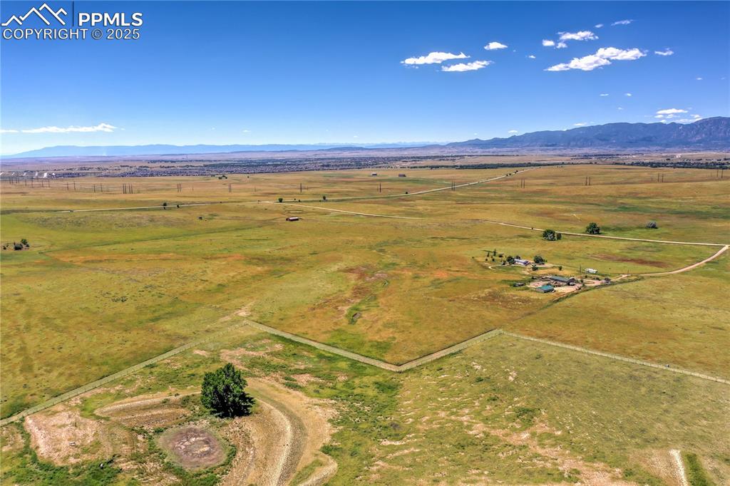 Image 42 of 48: Horse-ready property with secure fencing and expansive acreage for grazing,