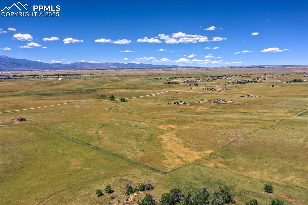 Image 43 of 48: Sweeping long-range views of rolling pastures