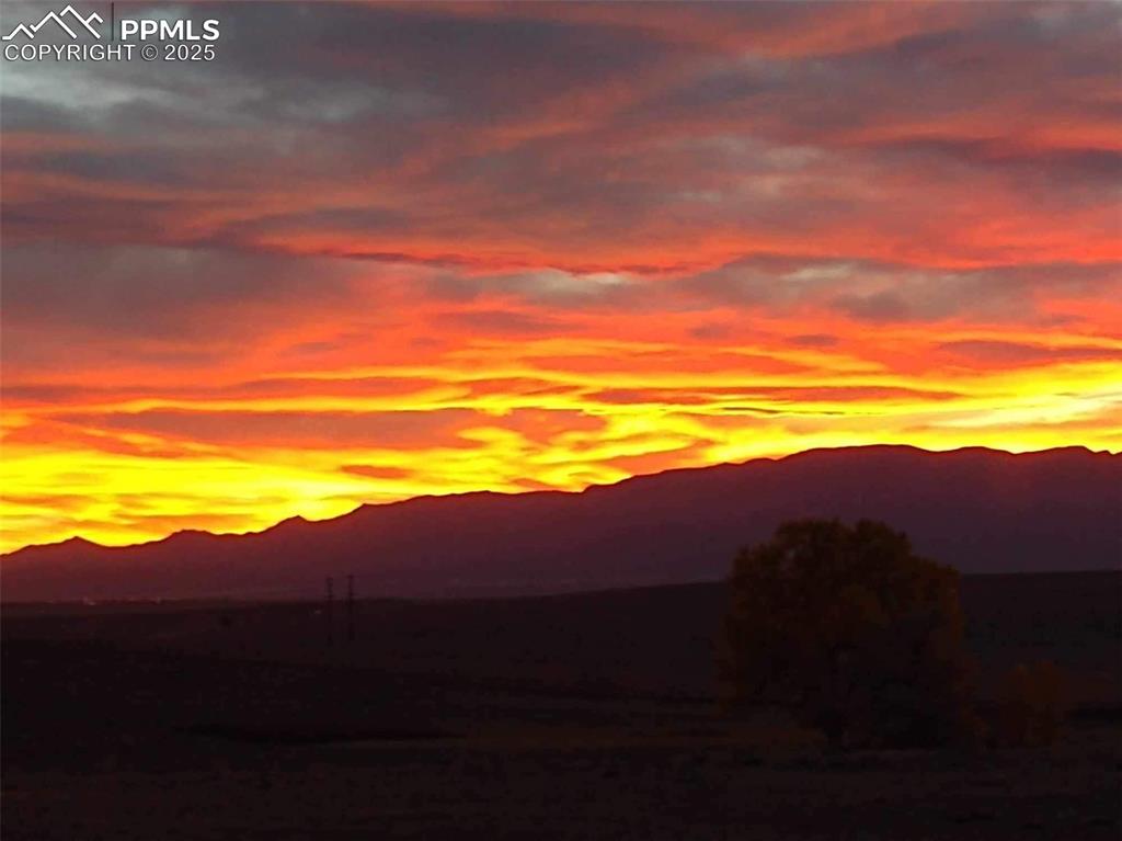 Image 47 of 48: Breathtaking sunsets over the Colorado plains and mountain vistas showcase 