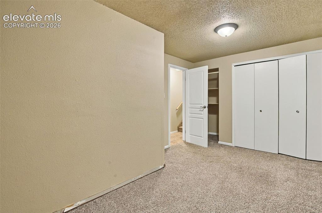 Image 20 of 26: Bedroom