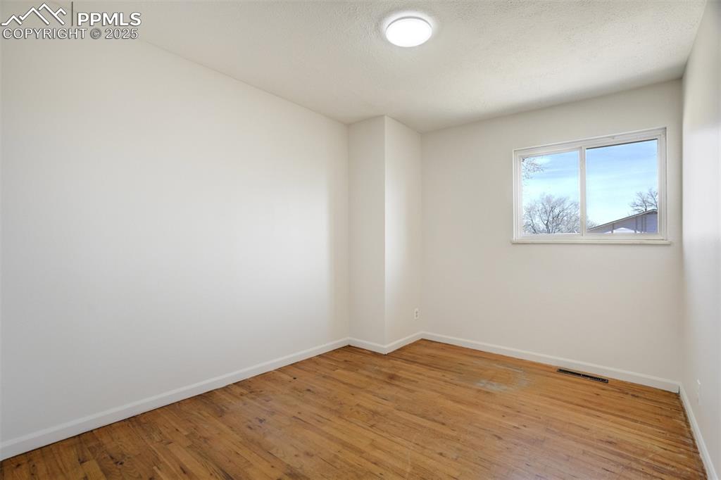 Image 17 of 34: One of 3 main level bedrooms