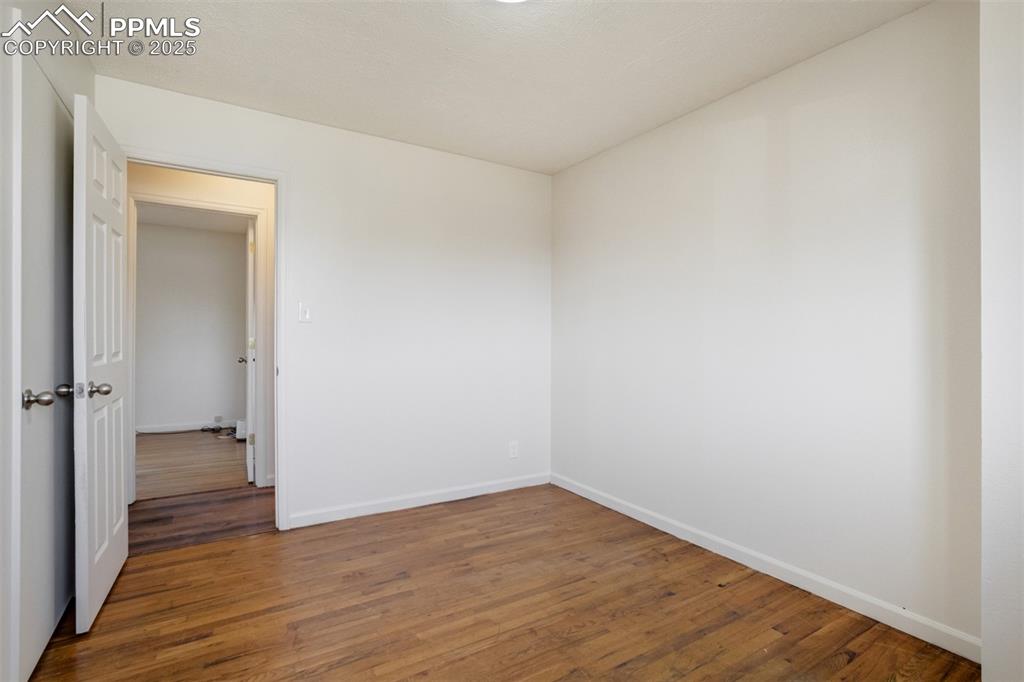 Image 18 of 34: One of 3 main level bedrooms