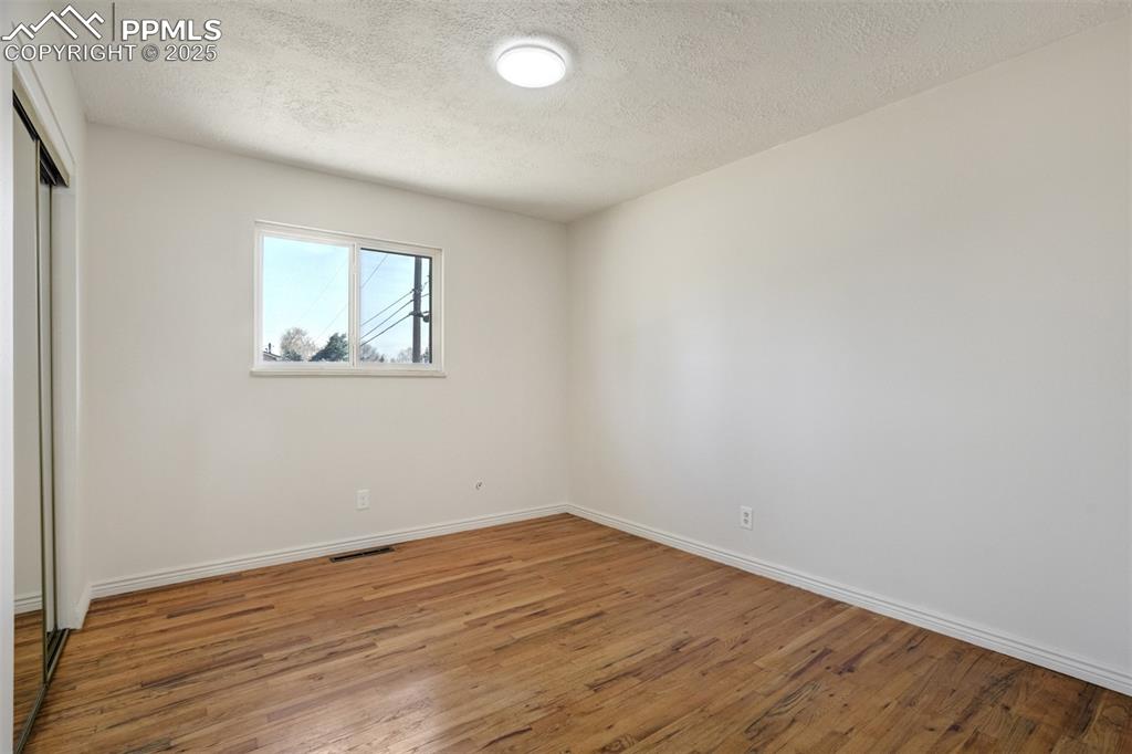 Image 19 of 34: One of 3 main level bedrooms