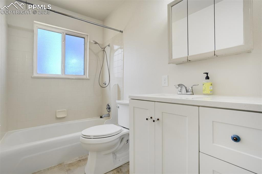 Image 20 of 34: Main level bath with updates