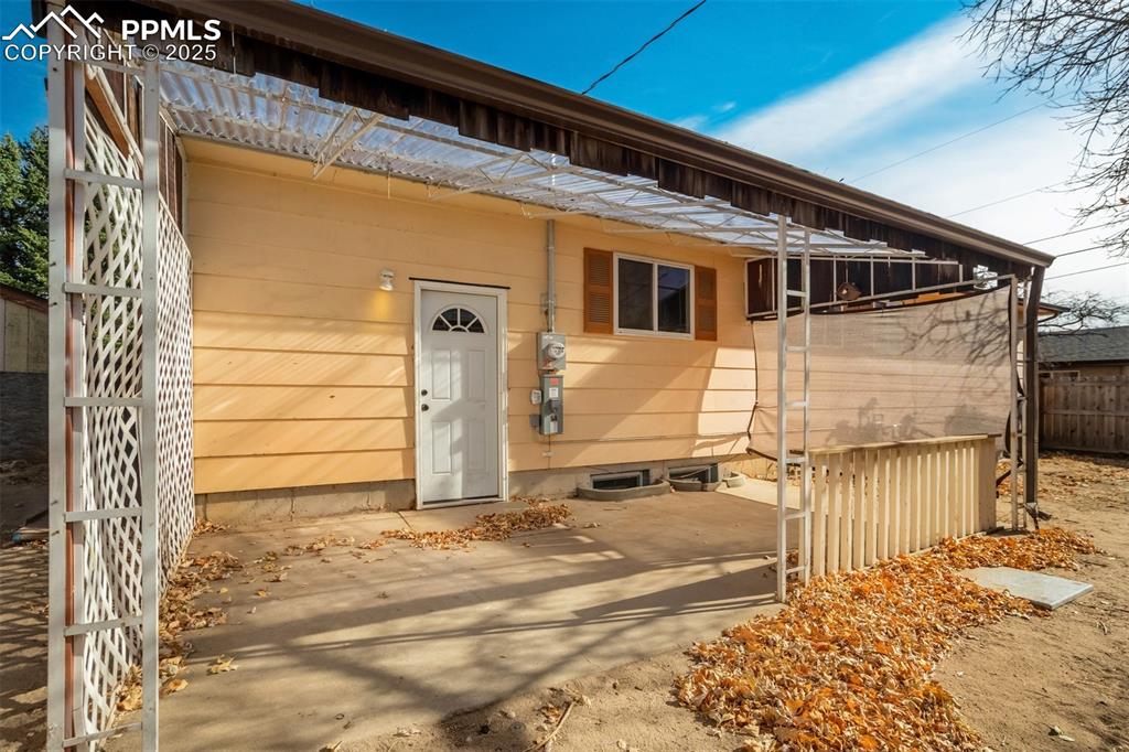 Image 32 of 34: Back patio perfect for BBQ
