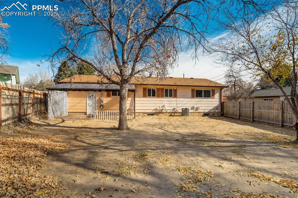 Image 33 of 34: Fully fenced back yard