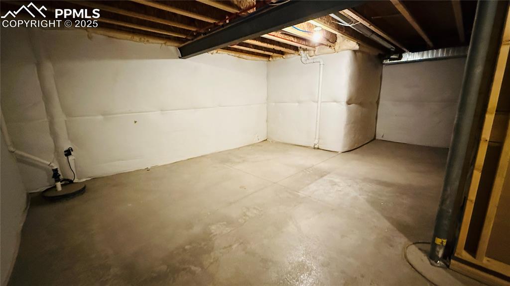 Image 23 of 28: View of unfinished below grade area, great storage area