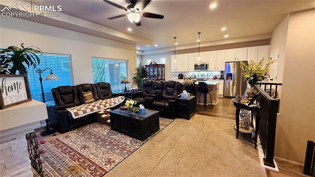 Image 8 of 28: View of carpeted living room