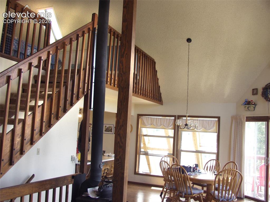 Image 22 of 33: w/ stairway to Loft area.