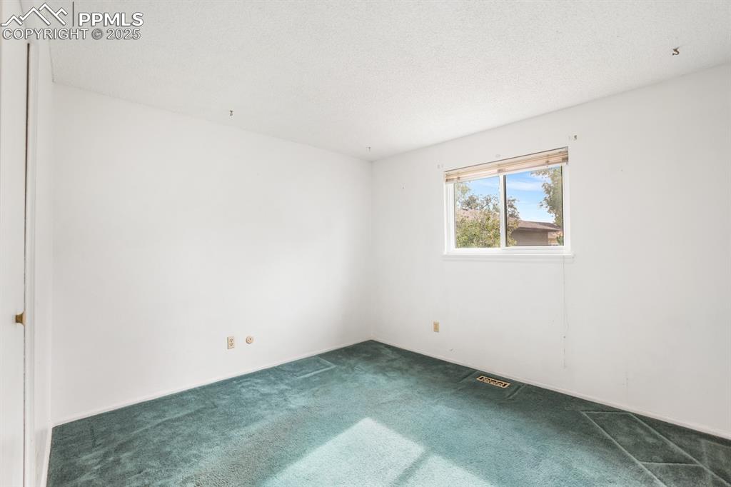 Image 13 of 33: Bedroom