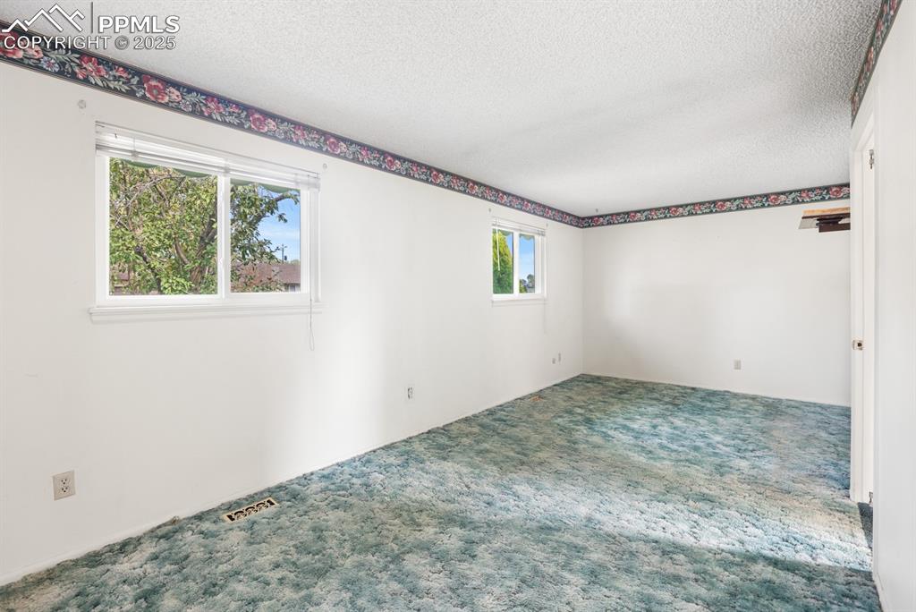 Image 9 of 33: Master Bedroom