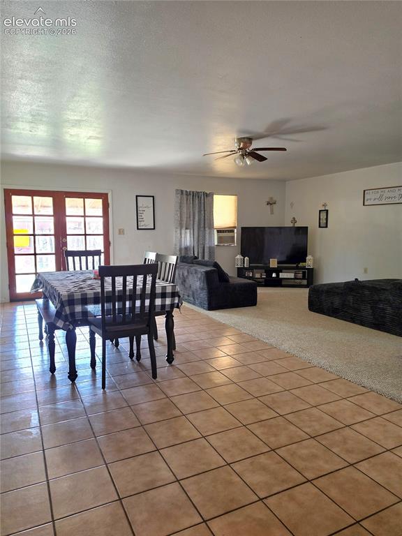 Image 12 of 39: Formal Dining room and Family room