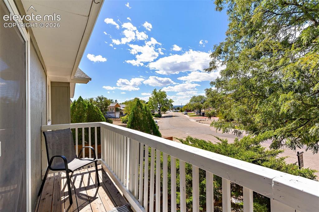 Image 10 of 24: View of balcony from kitchen