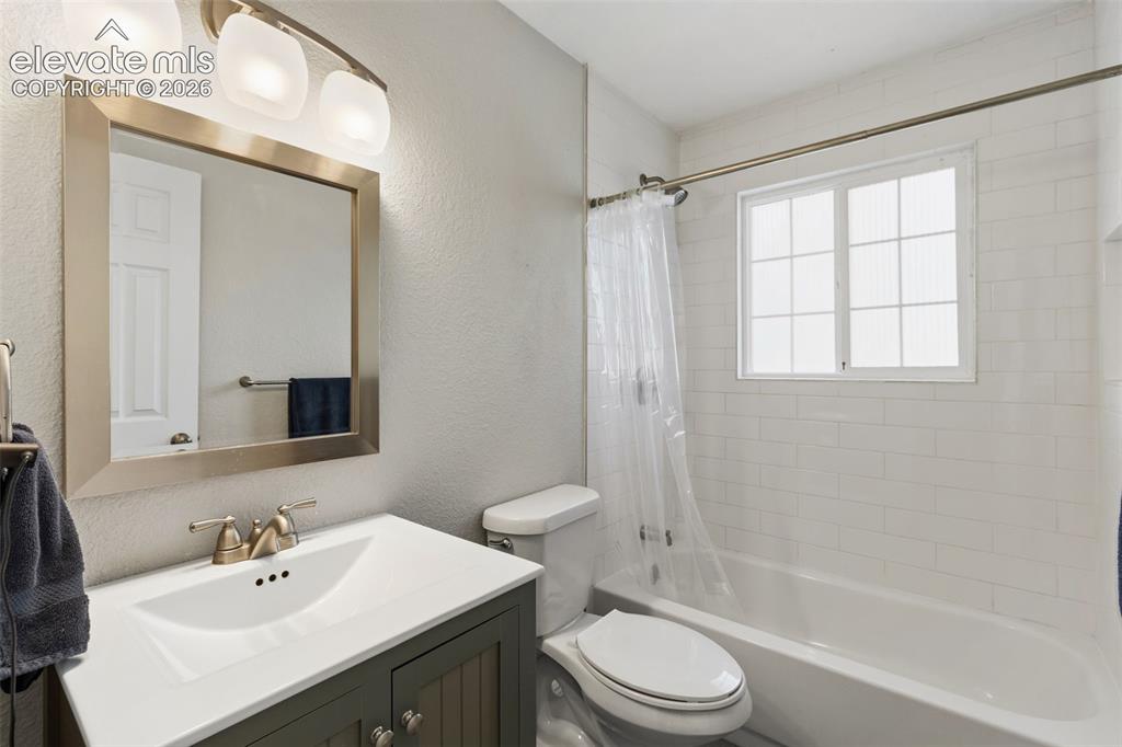 Image 14 of 34: Updated Downstairs Bathroom