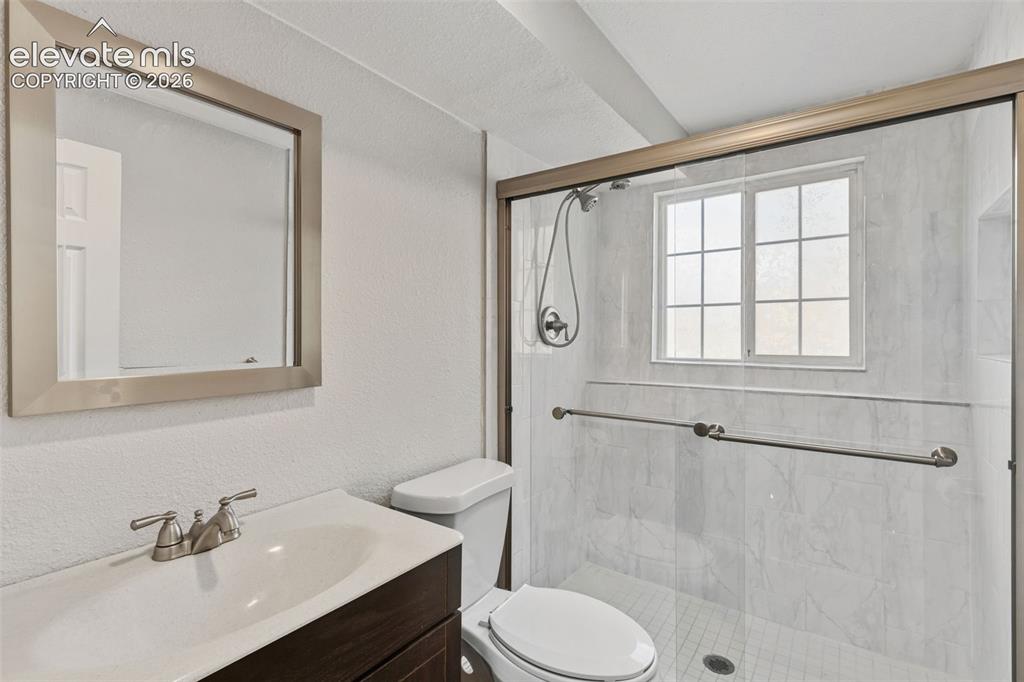 Image 19 of 34: Updated Downstairs Bathroom
