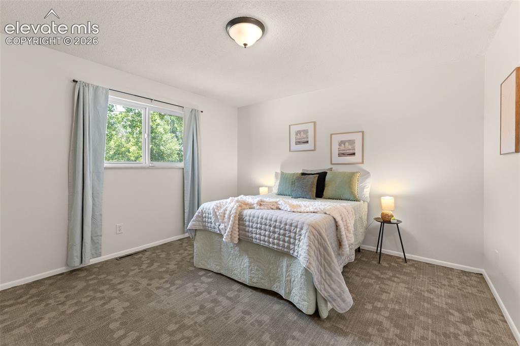 Image 15 of 49: Bedroom